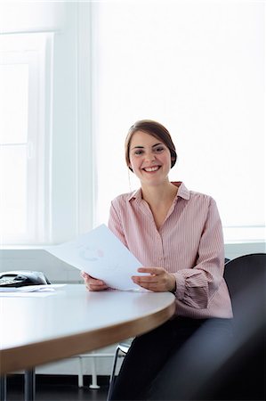 portraits of everyday people - Businesswoman working in office Stock Photo - Premium Royalty-Free, Code: 649-06041178