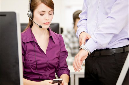 support and phones - Business people working in headsets Stock Photo - Premium Royalty-Free, Code: 649-06041227