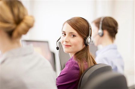 for sale - Businesswomen working in headsets Stock Photo - Premium Royalty-Free, Code: 649-06041237