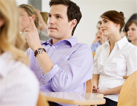 participating - Business people sitting in seminar Stock Photo - Premium Royalty-Free, Code: 649-06041292