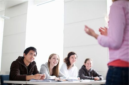 students in classroom - Teacher talking to students in class Stock Photo - Premium Royalty-Free, Code: 649-06041384