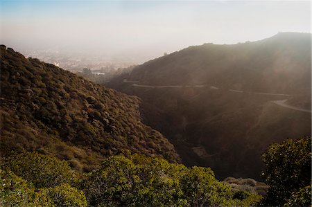 Aerial view of rural mountain road Fotografie stock - Premium Royalty-Free, Codice: 649-06041484