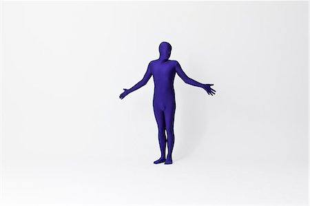 simsearch:649-06041674,k - Man in bodysuit shrugging Stock Photo - Premium Royalty-Free, Code: 649-06041679