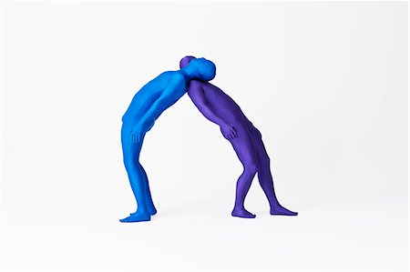 silhouette two people balancing - Men in bodysuits posing together Stock Photo - Premium Royalty-Free, Code: 649-06041708