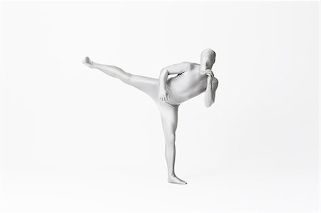 flexible - Man in bodysuit posing Foto de stock - Sin royalties Premium, Código: 649-06041701