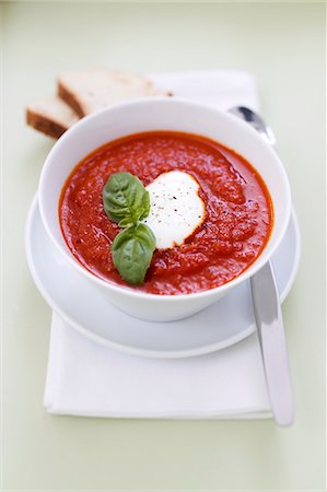 soup top view - Tomato soup with creme fraiche, basil and bread Stock Photo - Premium Royalty-Free, Code: 649-06112558