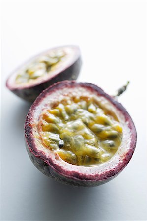 simsearch:649-06488868,k - Close up of sliced passion fruit Stock Photo - Premium Royalty-Free, Code: 649-06164375