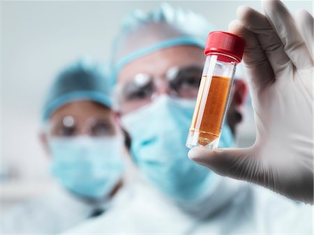 simsearch:649-06164786,k - Scientist examining test tube in lab Stock Photo - Premium Royalty-Free, Code: 649-06164776