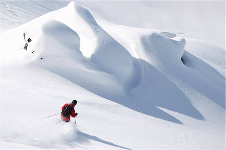 Skier coasting on snowy slope Stock Photo - Premium Royalty-Free, Code: 649-06164809