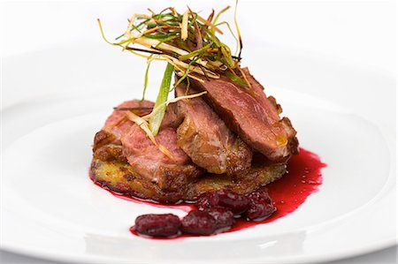 fresh food gourmet - Plate of lamb with leeks and cranberry Stock Photo - Premium Royalty-Free, Code: 649-06165079