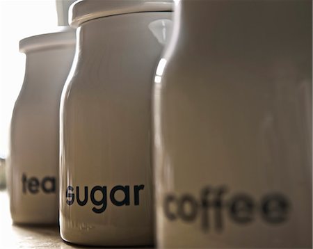 Close up of coffee, tea and sugar jars Foto de stock - Royalty Free Premium, Número: 649-06165106