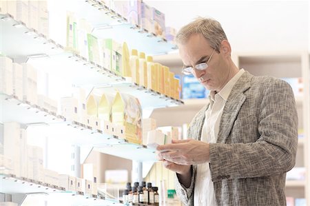 pharmacy lab - Man shopping in pharmacy Stock Photo - Premium Royalty-Free, Code: 649-06165167