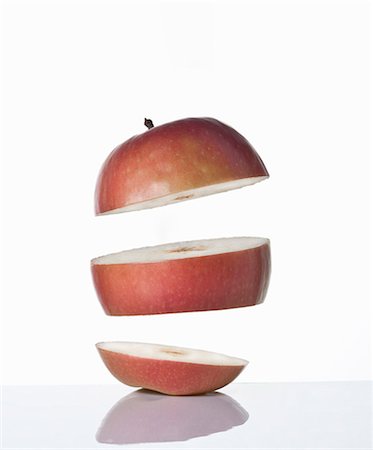 studio fruit - Close up of slices of apple Stock Photo - Premium Royalty-Free, Code: 649-06165318