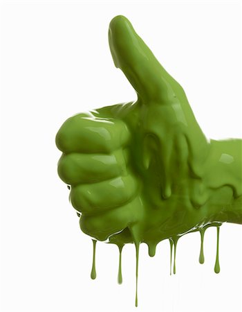 Green painted hand making thumbs-up Stock Photo - Premium Royalty-Free, Code: 649-06165332