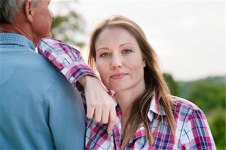 father - Woman standing with father outdoors Stock Photo - Premium Royalty-Free, Code: 649-06304865