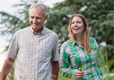 senior father with daughter - Woman and father walking outdoors Stock Photo - Premium Royalty-Free, Code: 649-06304869