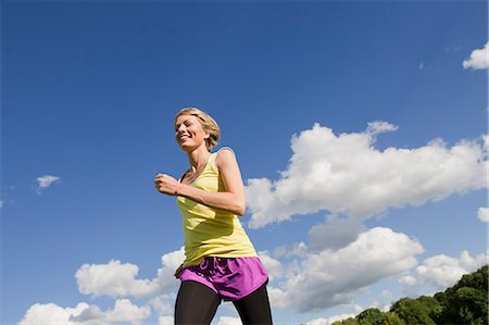 running blonde woman - Woman jogging outdoors Foto de stock - Sin royalties Premium, Código: 649-06305017