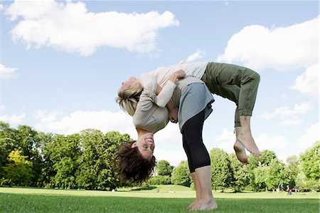 person upside down - Women playing together in park Stock Photo - Premium Royalty-Free, Code: 649-06305029