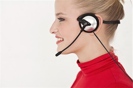 Businesswoman wearing headset Foto de stock - Sin royalties Premium, Código: 649-06305281