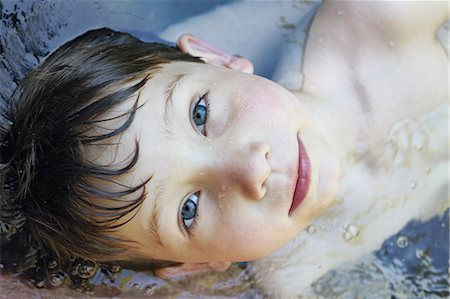 shirtless - Close up of boys face in river Stock Photo - Premium Royalty-Free, Code: 649-06305352