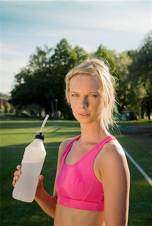 soccer player female standing - Runner drinking water in park Stock Photo - Premium Royalty-Free, Code: 649-06305591