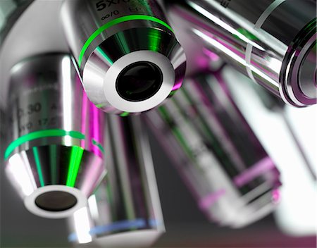 science microscope - Close up of microscope lenses in lab Stock Photo - Premium Royalty-Free, Code: 649-06352456