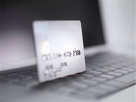 e-commerce - Close up of credit card on keyboard Foto de stock - Sin royalties Premium, Código: 649-06352451