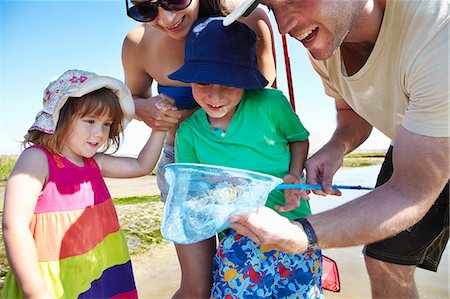 family happy asian four - Family fishing with nets outdoors Stock Photo - Premium Royalty-Free, Code: 649-06352466