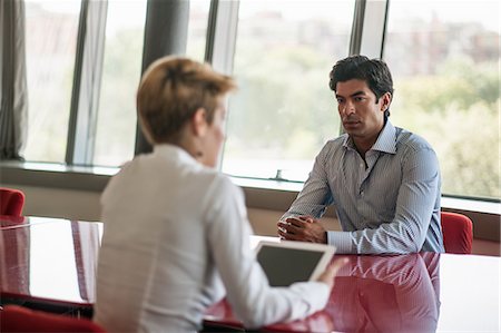 portable devices - Business people talking in meeting Stock Photo - Premium Royalty-Free, Code: 649-06352526