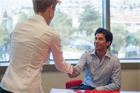partner (activity) - Business people shaking hands in meeting Stock Photo - Premium Royalty-Free, Code: 649-06352528