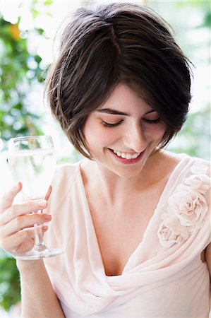 Woman having glass of wine outdoors Stock Photo - Premium Royalty-Free, Code: 649-06352552