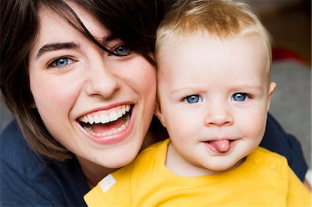 funny happy adult portrait - Mother and baby posing together Stock Photo - Premium Royalty-Free, Code: 649-06352563