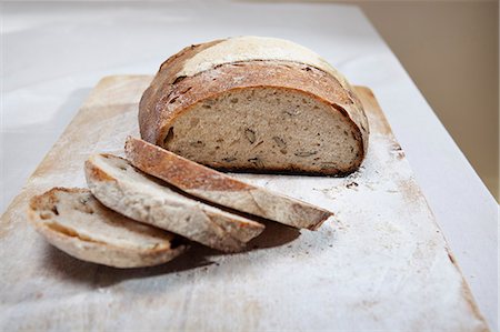 Close up of sliced loaf of bread Stock Photo - Premium Royalty-Free, Code: 649-06352598