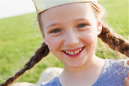 pigtails braided - Close up of girls smiling face Stock Photo - Premium Royalty-Free, Code: 649-06352664