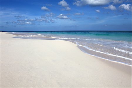 Waves washing on tropical beach Foto de stock - Sin royalties Premium, Código: 649-06352697