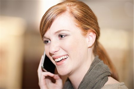 simsearch:649-06400445,k - Smiling woman talking on cell phone Stock Photo - Premium Royalty-Free, Code: 649-06400450
