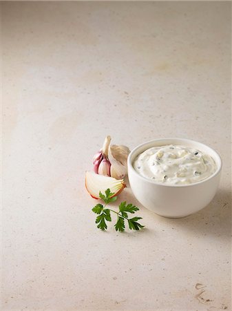 dipping sauces - Bowl of onion garlic dip Stock Photo - Premium Royalty-Free, Code: 649-06400605