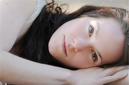 simsearch:649-06400652,k - Close up of woman laying on ground Stock Photo - Premium Royalty-Free, Code: 649-06400656