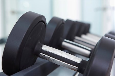 dumb bell in a gym - Close up of free weights in gym Stock Photo - Premium Royalty-Free, Code: 649-06400788