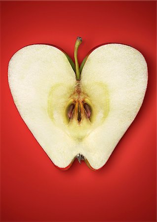 Gros plan de pommes coupées en deux Photographie de stock - Premium Libres de Droits, Code: 649-06400883