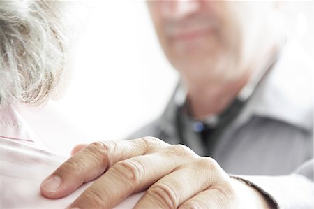 doctor comforting a patient - Doctor with hand on patient's shoulder Stock Photo - Premium Royalty-Free, Code: 649-06401267