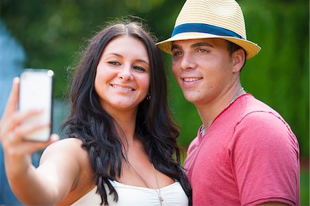 selfie summer - Couple taking picture of themselves Stock Photo - Premium Royalty-Free, Code: 649-06401467