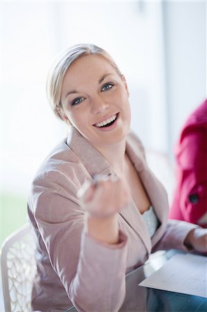 Businesswoman talking in meeting Stock Photo - Premium Royalty-Free, Code: 649-06432285