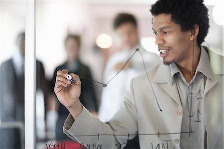 south africa and together - Businessman drawing graph on window Foto de stock - Sin royalties Premium, Código: 649-06432324