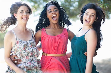 smiling laughing beauty - Smiling women hugging outdoors Stock Photo - Premium Royalty-Free, Code: 649-06432335