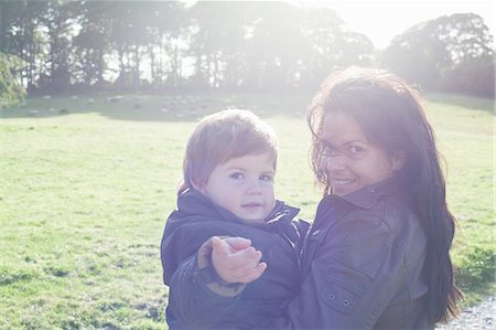 simsearch:649-06489097,k - Mother holding son outdoors Stock Photo - Premium Royalty-Free, Code: 649-06432440