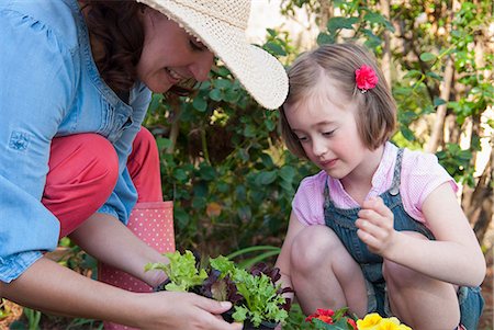 Mother and daughter gardening together Stock Photo - Premium Royalty-Free, Code: 649-06432660