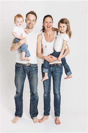 family cutout - Smiling children posing together Stock Photo - Premium Royalty-Free, Code: 649-06432750