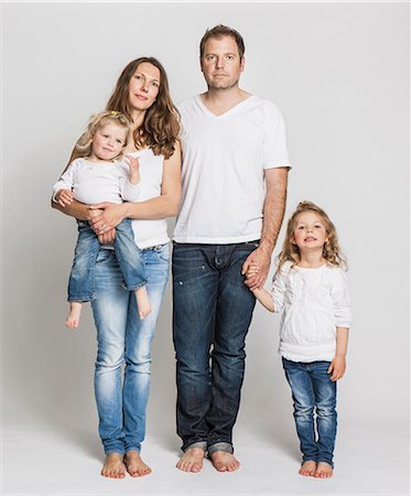 studio portrait white background - Family posing together Stock Photo - Premium Royalty-Free, Code: 649-06432760