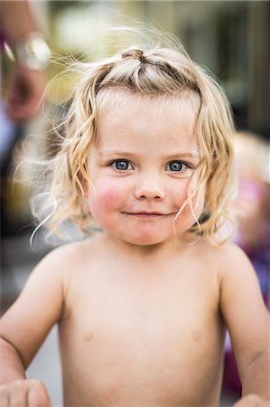 smiling babies alone - Smiling toddler girl standing outdoors Stock Photo - Premium Royalty-Free, Code: 649-06432771